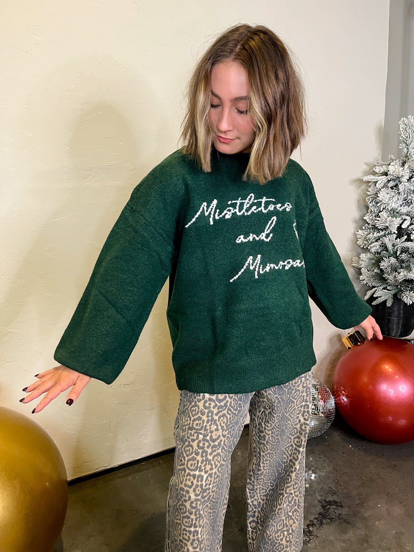 Mistletoe & Mimosas Sweater