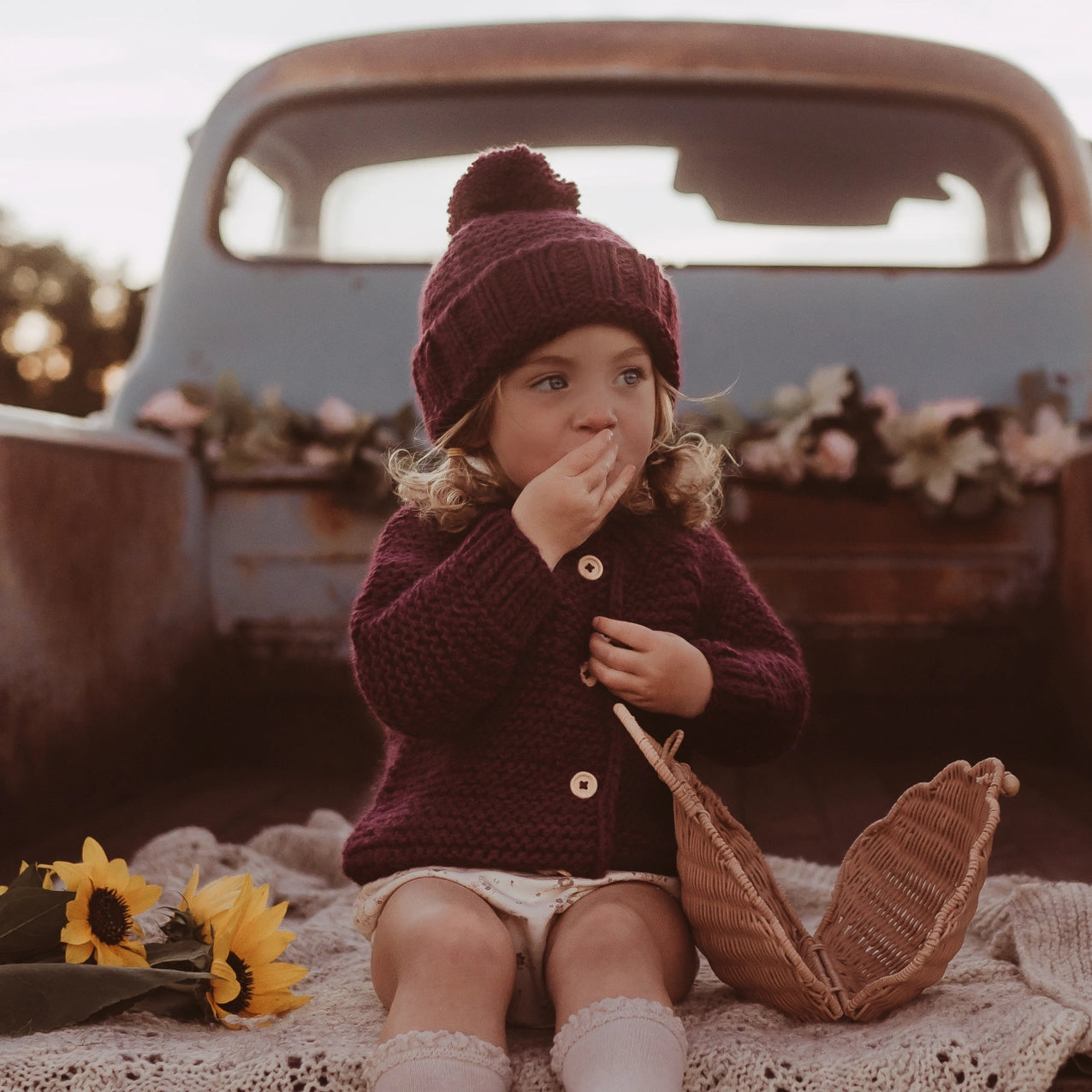 Plum Garter Stitch Baby Cardigan - Revel Boutique